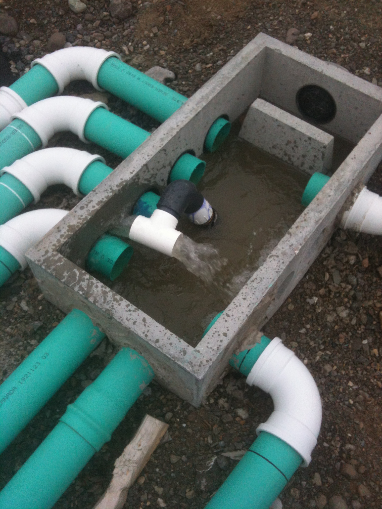 Plumbing of septic drain field in pump up system